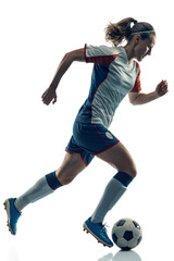 Dynamic Female Soccer Player Dribbling and Sprinting with Ball
Side View of Woman Football Athlete Running in Action
Focused Woman in Uniform Controlling Soccer Ball at Speed