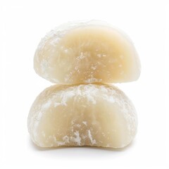 Two halves of mochi resting on a white background, showcasing japanese cuisine