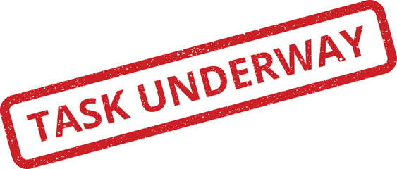 Grunge rubber stamp effect indicating a task underway status, ideal for project progress tracking and ongoing work updates