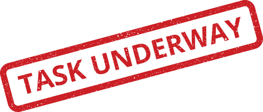 Grunge rubber stamp effect indicating a task underway status, ideal for project progress tracking and ongoing work updates
