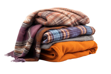 Stack of cozy blankets in various patterns and colors