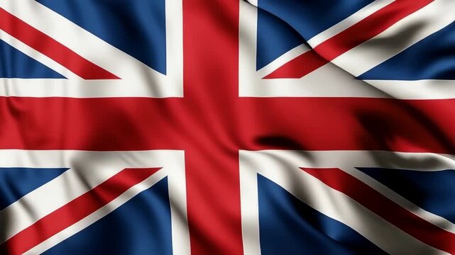 A close-up video of the UK flag waving gently, captured from a low angle. The vibrant colors and fabric texture create a dynamic, patriotic scene. Live desktop wallpaper.