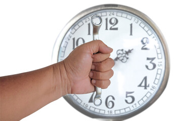 Hand holds a spanners with blur white clock.