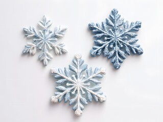 82. Snowflake decorations placed neatly on a white background