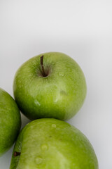 Minimal flat lay green apples on white background clean copy space eco branding template