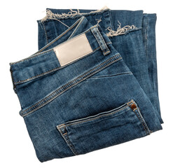 Folded dark blue jeans on a white background. Cloth. Jeans isolate