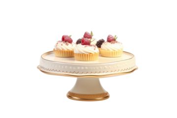 Delicious berry tarts on a decorative cake stand