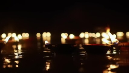 Floating oil lamps lighting up the night.