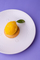 Top-down view: lemon dessert on purple - freshness, texture and clean lines