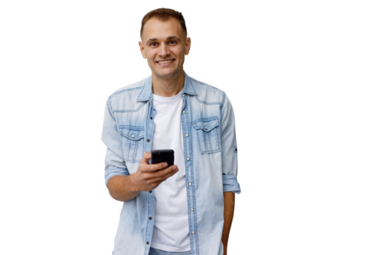 Smiling man communicating using smartphone, holding mobile phone, enjoying modern technology, white t-shirt, transparent background