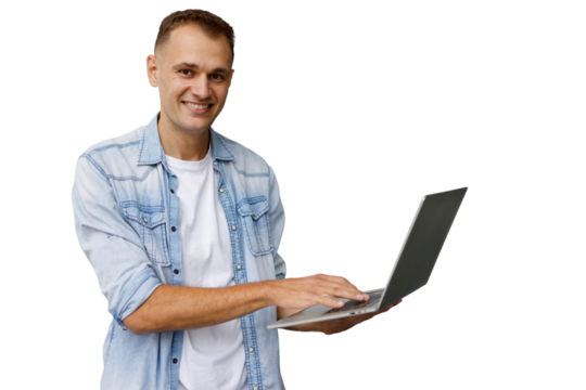 Smiling man working on laptop, networking, studying, or freelancing, standing on transparent background