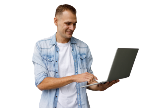 Young man using laptop, remote working, smiling and browsing online with transparent background