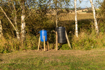 Makeshift Pheasant Feeders in a Game Shooting Rural Location on a Summer Evening