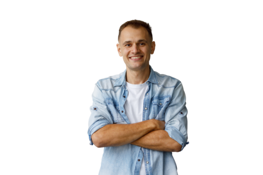 Young man smiling, confidently posing with crossed arms in denim shirt on transparent background - Powered by Adobe