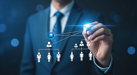 Businessman drawing organization chart with digital pen on virtual screen interface showing hierarchy and team structure for business strategy