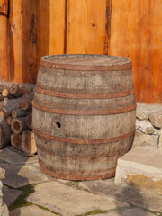 Firewood Stack and Barrel in Rustic Outdoor Setting