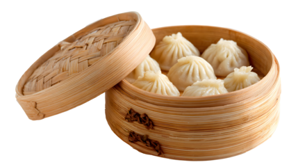 Steamed buns in bamboo steamer on white background