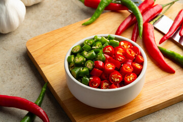 Sliced Red Chilli and green Chili Pepper in a bowl.(Thai Chili Jinda)