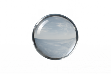 Glass sphere reflecting sky and clear horizon on transparent background