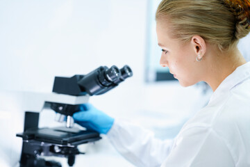 A pharmaceutical Quality Control QC team ensures GxP compliance. Two scientists review an...