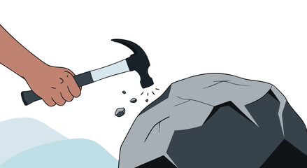 Hammer hitting a large rock to break it apart.   © RABBI