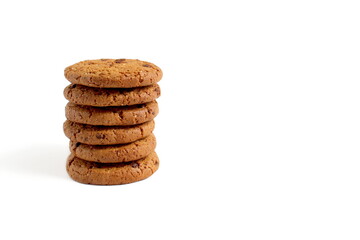 There are oatmeal cookies on a white background.	