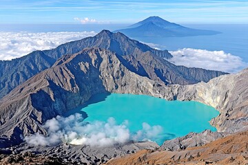 Crater lake with turquoise water amid rugged mountain range