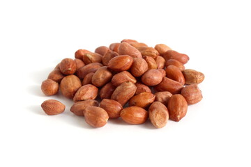 A small pile of peanuts in their shells lie on a white background.