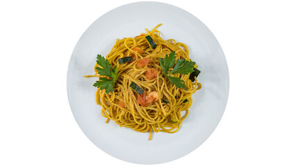 Delicious spaghetti pasta with shrimp and parsley on white plate