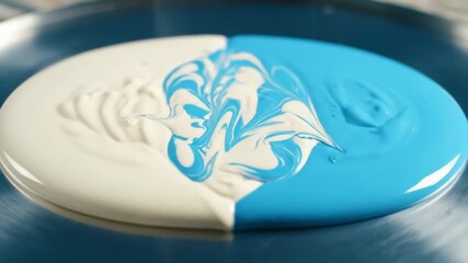 Pouring Blue Paint Into White Paint Creating Artistic Swirls on Silver Surface - Powered by Adobe