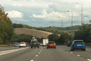 Cars on a motorway to Brighton, England, cars moving on a motorway . UK