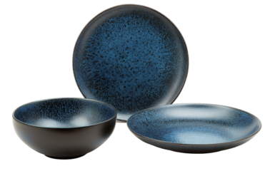 Three ceramic bowls and a plate with a dark blue and black glaze isolated on transparent background