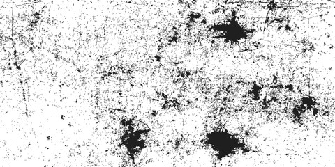 Old, textured black grunge pattern design with an ink splash effect forming a dirty vintage wall background