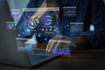 Businessman leveraging big data analytics for smart business decision making, identifying patterns,...