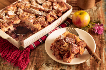 Apple bread pudding sprinkled with icing sugar