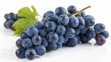 Fototapeta premium Blue Grapes with leaves isolated in white background