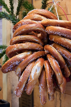 Strasbourg, France,   Europe. Fresh baked pretzels on display during the Christmas holiday season.