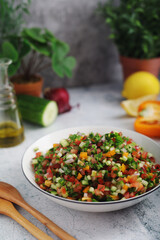 A bowl with traditional Israeli Salad