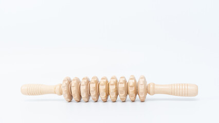 Wooden cellulite treatment tool designed for body massage, featuring smooth rollers and ergonomic...