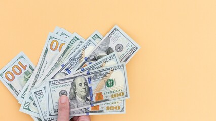 Hand Full of United States Currency, Financial Freedom and Wealth Concept, Investment