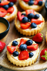 tartlets with cream cheese and berries