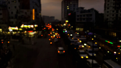 A fast motion timelapse of urban car traffic creating light trails on a city highway at night