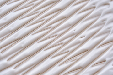 An unusual pattern of cosmetic moisturizer.