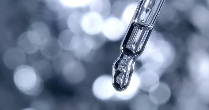 Slow Motion of Crystal Clear Serum Drop Dripping from Glass Pipette at 1000fps  Transparent Beauty Essence, Facial Care Serum, Luxury Skincare Product, Minimalist Background, Cosmetic Macro Detail