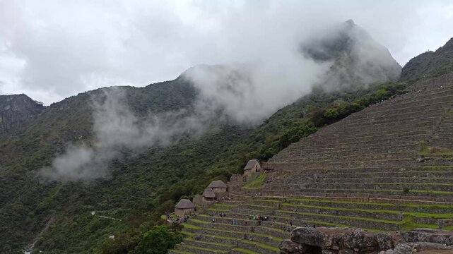 Machu Picchu ancient city view from Huchu'y Picchu in cloudy weather
