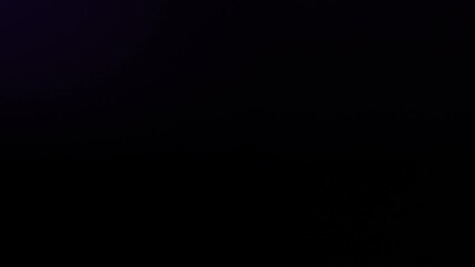 Dynamic 4K stock footage of blue and red lights flashing rhythmically in the corner against a dark black background - Powered by Adobe