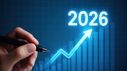 Business growth 2026 target goal achievement upward arrow chart hand pen progress increase financial forecast optimistic strategy planning