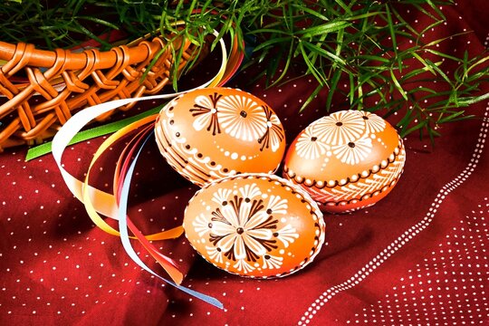 Easter, spring holiday - beautiful colorful Easter eggs, Czech home tradition of decorating with wax,
still life with Easter eggs and spring flowers, - Powered by Adobe