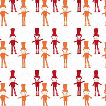 pattern con soldatini schiaccianoci arancio e rossi su sfondo a palline
