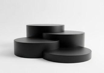Minimalist black cylindrical pedestals on a white background